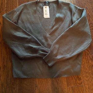 Green batwing v neck sweater